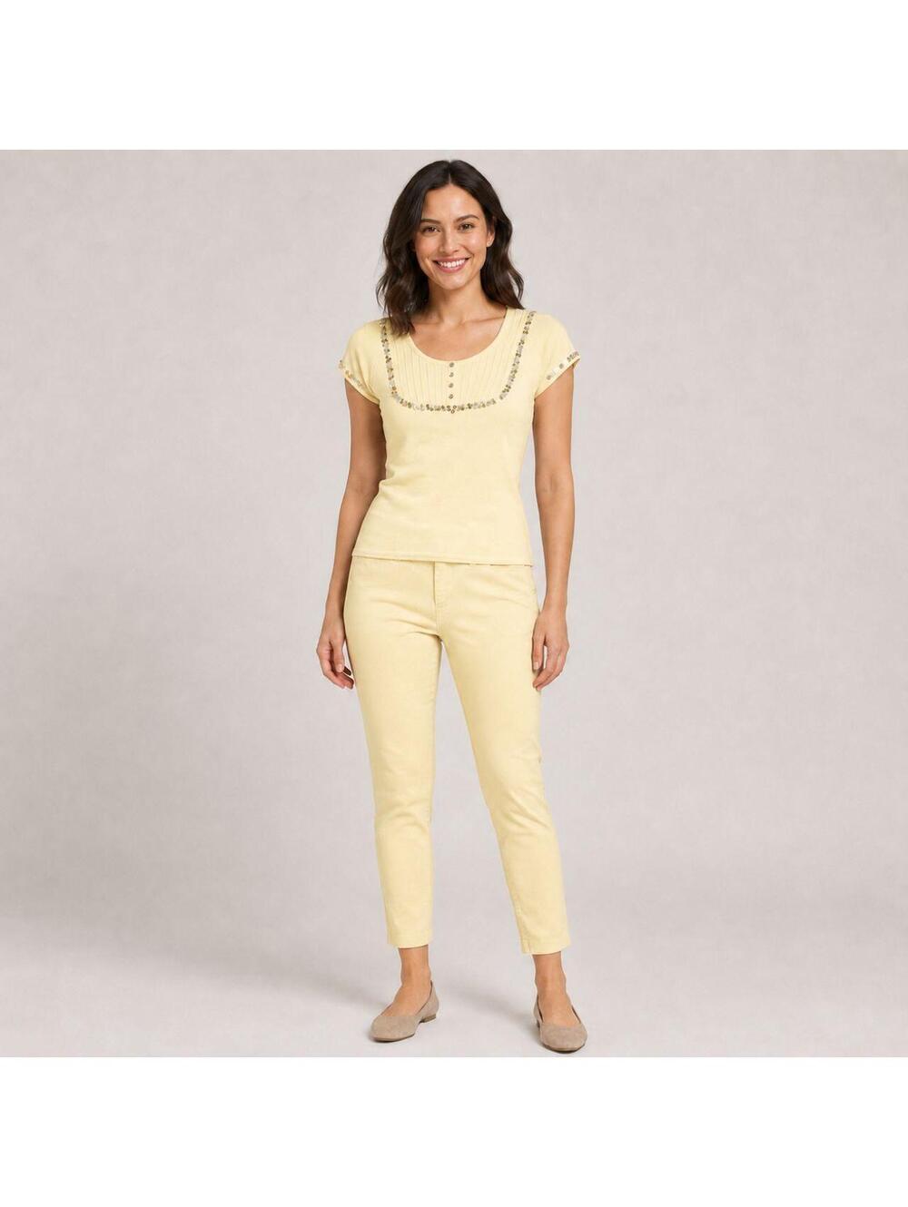 2 piece pale yellow outfit.